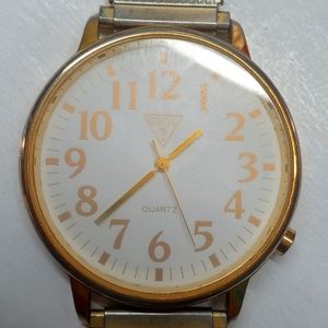 Guess gold watch swiss movt.
